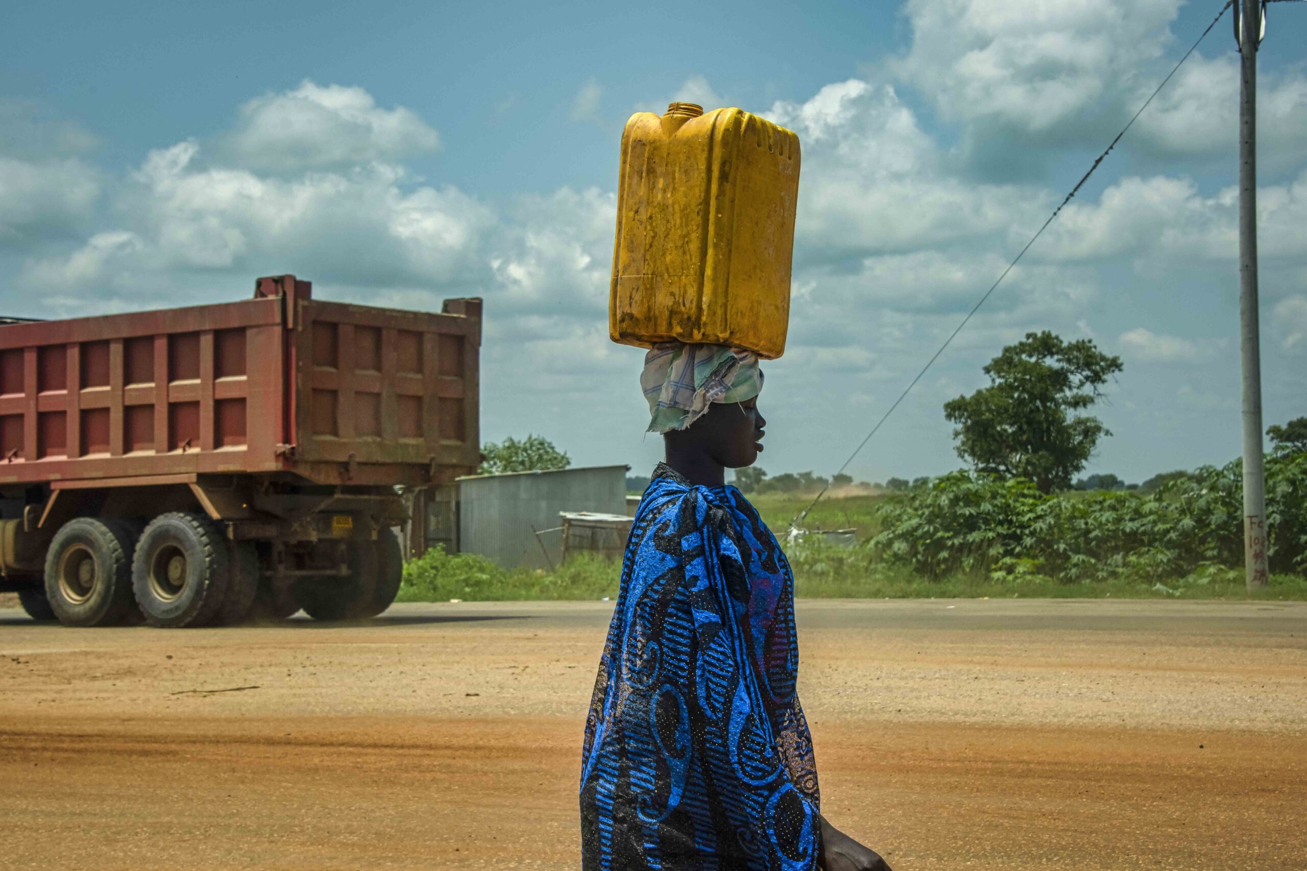 A women collects water in Juba, South Sudan. Image by Rod Waddington.