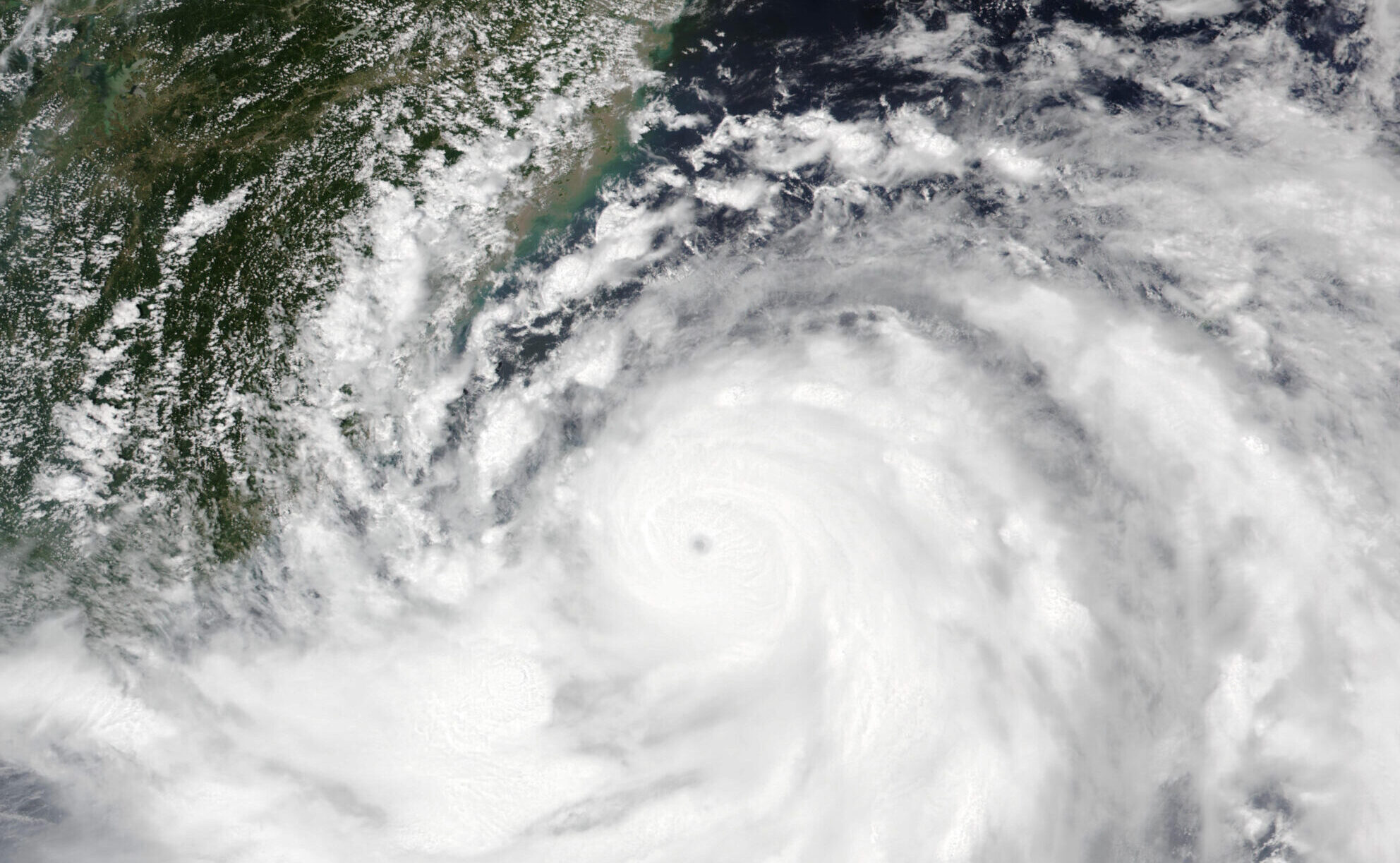 A satellite image of typhoon Gaemi, pictured as a swirling mass of cloud close to the island of Taiwan